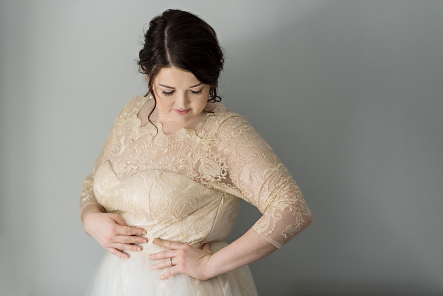 A portrait of a bride in her wedding dress.